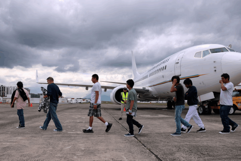 People deported from the United States arrive in Guatemala City on June 26. (Anna Moneymaker/Reuters)